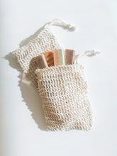 Load image into Gallery viewer, soap scrap grab bag | exfoliating eco-friendly soap saver bag filled with sample soaps