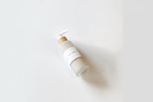Load image into Gallery viewer, cocoa cashmere hydrating body lotion | sandalwood &amp; vanilla
