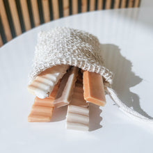 Load image into Gallery viewer, soap scrap grab bag | exfoliating eco-friendly soap saver bag filled with sample soaps

