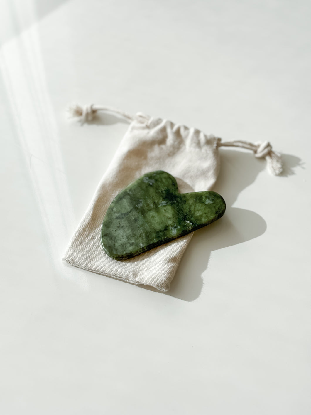 gua sha stone | jade facial massage tool